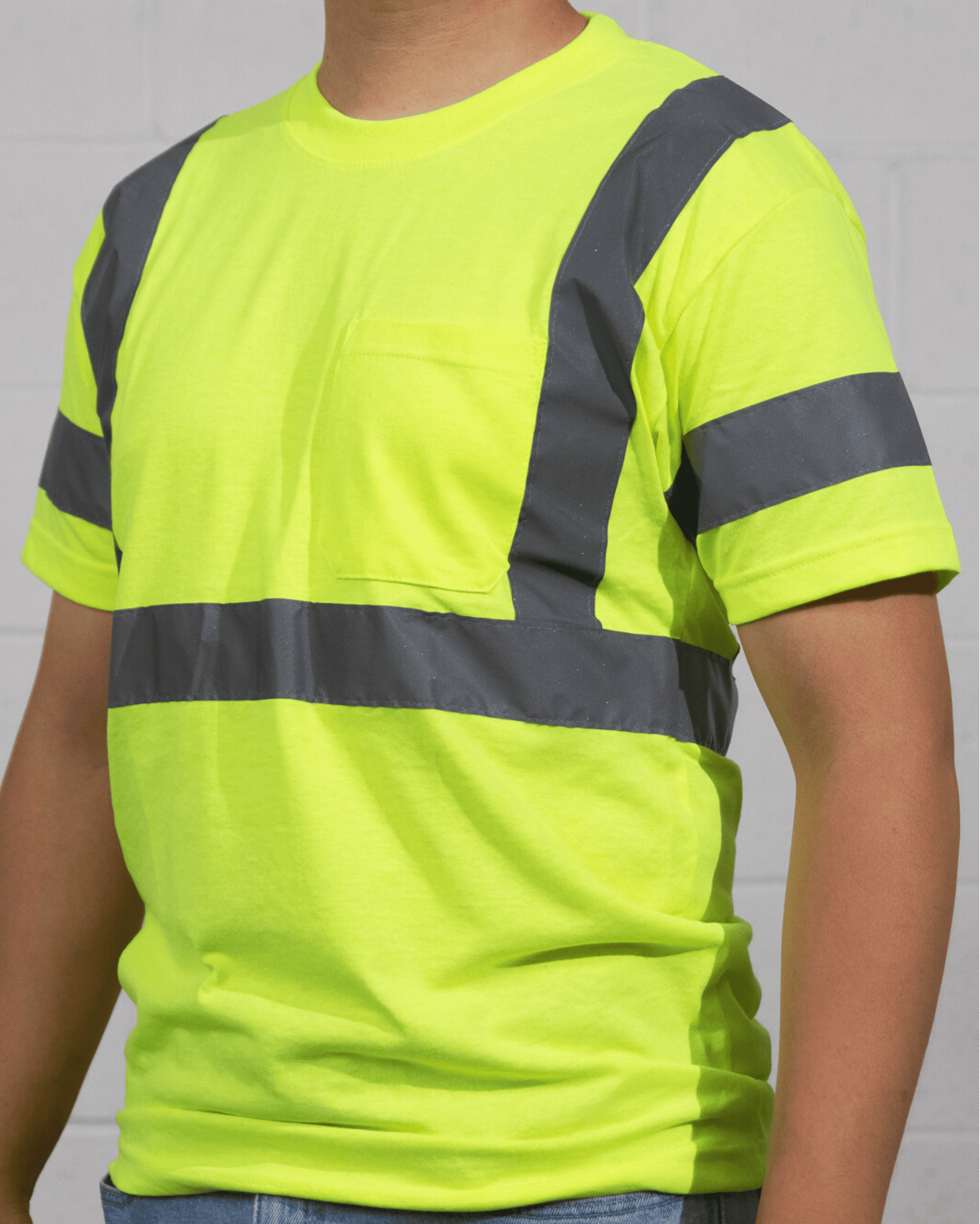 A man wearing Suna Cotton® Safety Green Reflective T-shirt